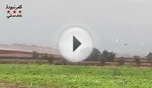 Сирия.Хама.Ми-24 парой проходят над деревенькой Кафр Набуда.